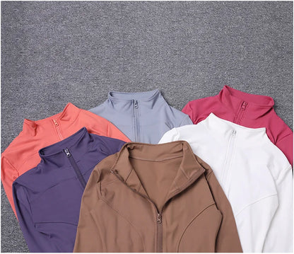 Multi-color fitted polyester sport jackets with zip fronts for gym training and yoga.