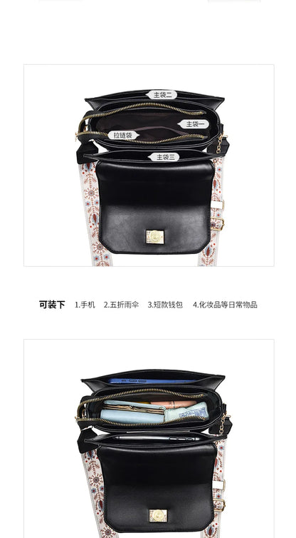 Black multi-compartment leather shoulder bag with a patterned strap and labeled interior compartments.