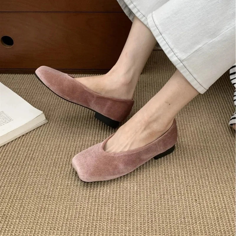 Dusty pink suede slip-on flats with square toes for comfortable all-day wear.