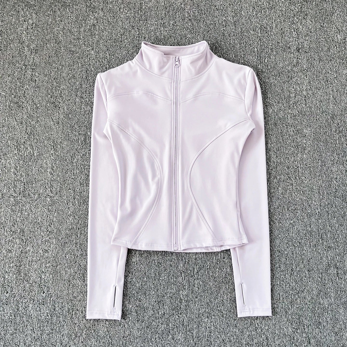 Light purple polyester fitted sport jacket with a zip front for gym training and yoga.