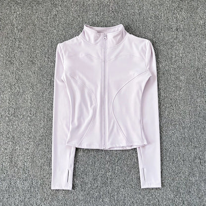 Light purple polyester fitted sport jacket with a zip front for gym training and yoga.