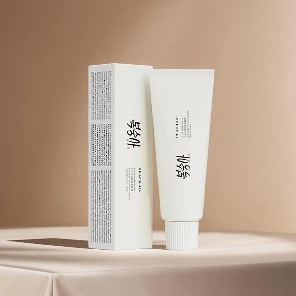 White Peach Jo+ rice extract moisturizing cream tube and matching rectangular box with black text.