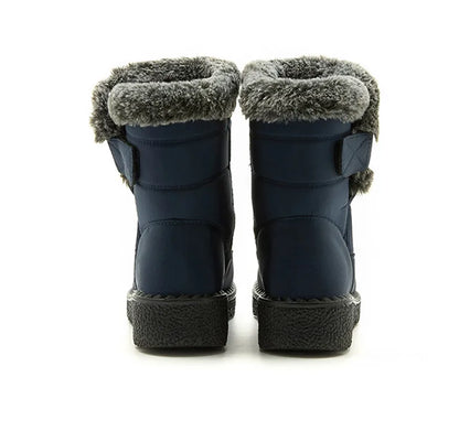 Navy blue winter snow boots with grey faux fur trim, side Velcro strap, and textured flat soles.