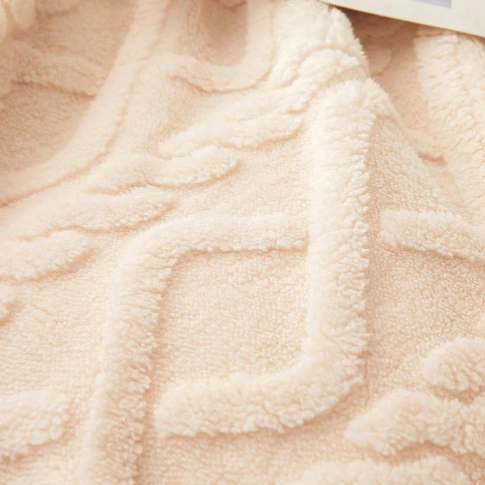 Coral fleece blanket with geometric jacquard pattern