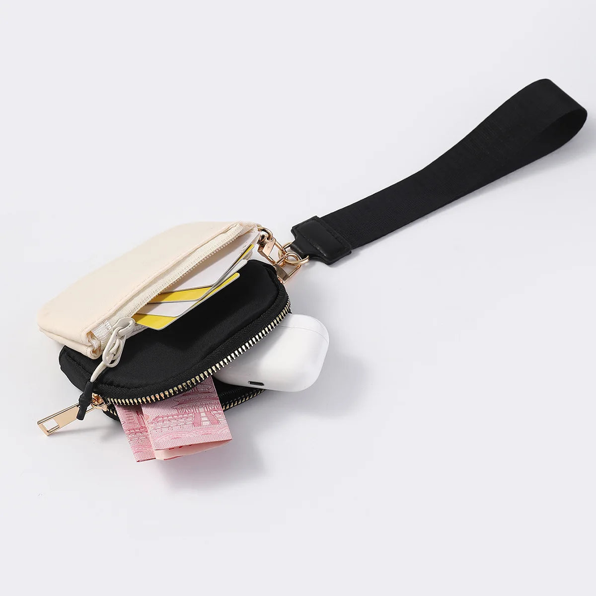 Beige and black nylon dual pouch wristlet wallet with zip closure for holding cards and cash on the go.