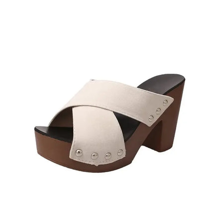 White flock cross-strap platform sandals with silver rivets and wood-look heel for everyday wear.