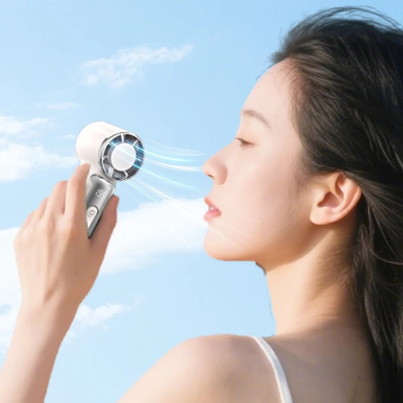 Portable Handheld Plastic Mini Fan With Led Display On The Go