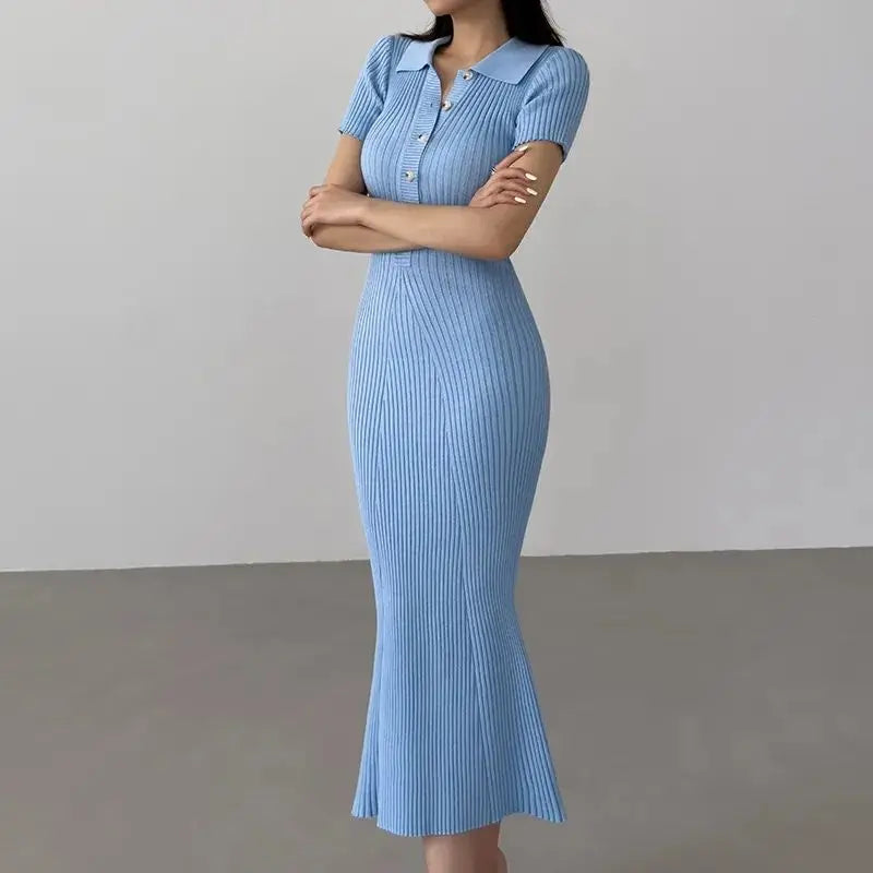 Light blue ribbed knit mermaid dress with a polo collar for resort wear.