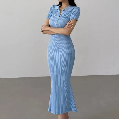 Light blue ribbed knit mermaid dress with a polo collar for resort wear.