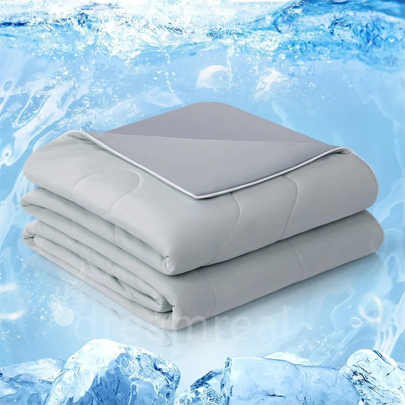 Light gray quilted breathable bedding for hot sleepers with moisture-wicking arc-chill technology.