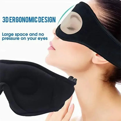 Black soft fleece wireless 3D sleep eye mask with built-in speakers and ergonomic molded eye cups.