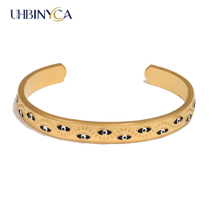 Women’s stainless steel cuff bracelet with an evil eye motif