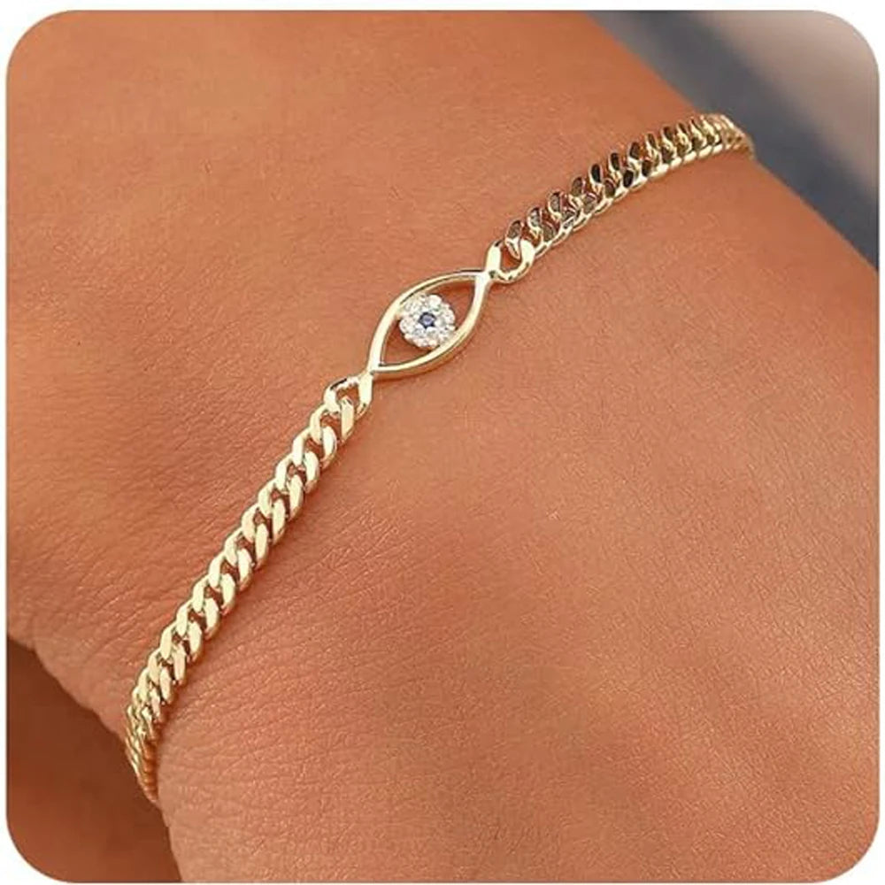 Women's pearl bracelet with heart and evil eye charms
