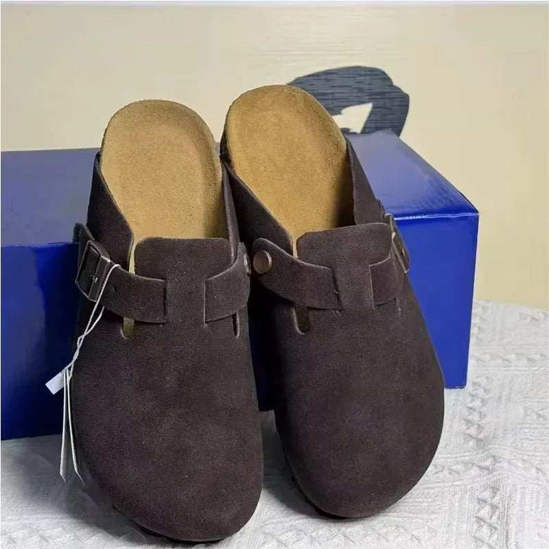 Dark brown suede mules with a side buckle strap and non-slip sole for comfortable beach wear.