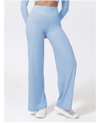 Light blue high waist sculpting leggings in stretchy knit fabric for yoga and exercise.