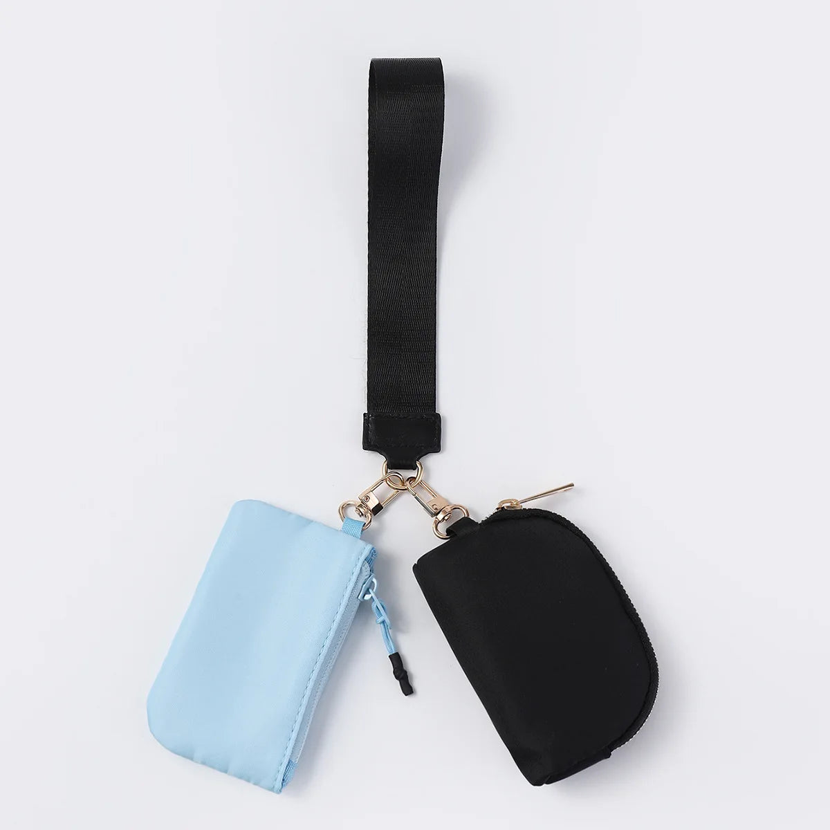 Blue and black nylon dual pouch with zip closure and adjustable strap, a waterproof wristlet wallet for daily errands.