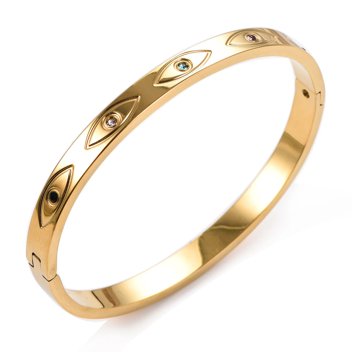 Gold stainless steel cuff bracelet with engraved evil eye motifs inset with small colored crystals.