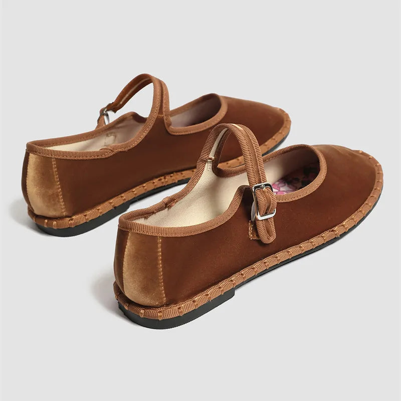 Women's floral-lined Mary Jane flats with buckle strap
