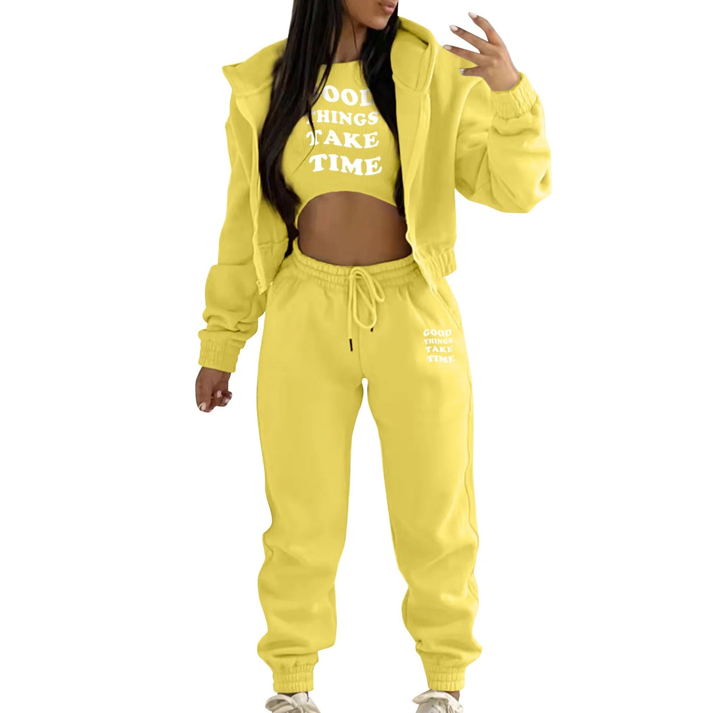 Yellow plush knit sweater set with white letter print and high waist joggers for casual lounge wear.