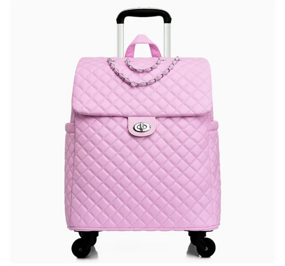 Pink quilted leather rolling travel bag with a chain accent, top handle, silver turn-lock clasp, and extendable handle.