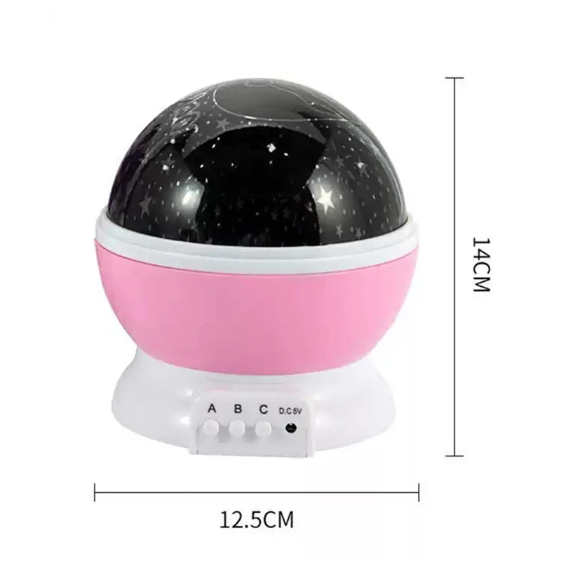 Pink and white dome-shaped LED night light with 360-degree rotation, used for bedroom star projection home decor.