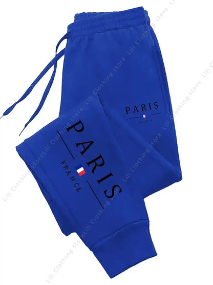 Blue fleece-lined high waist jogger pants with Paris France print for lounge wear.