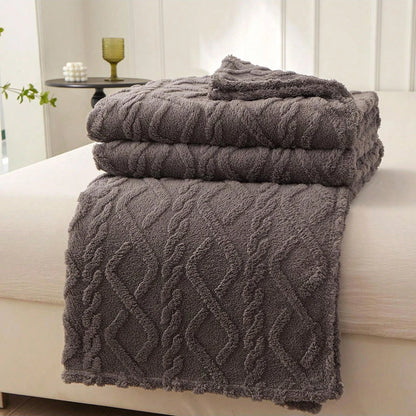 Coral fleece blanket with geometric jacquard pattern