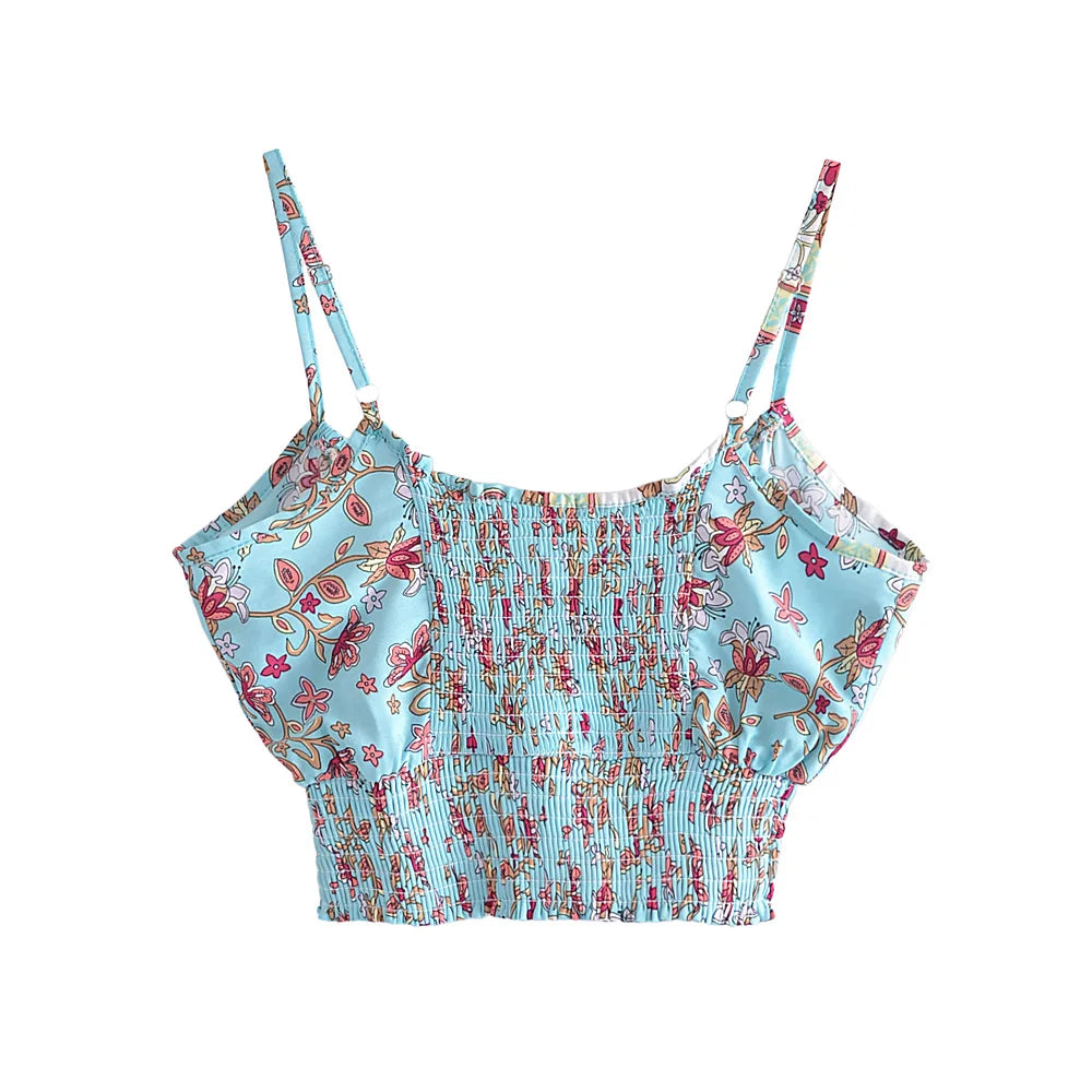 Light blue floral crop top with a stretchy smocked back and spaghetti straps for summer outfits.
