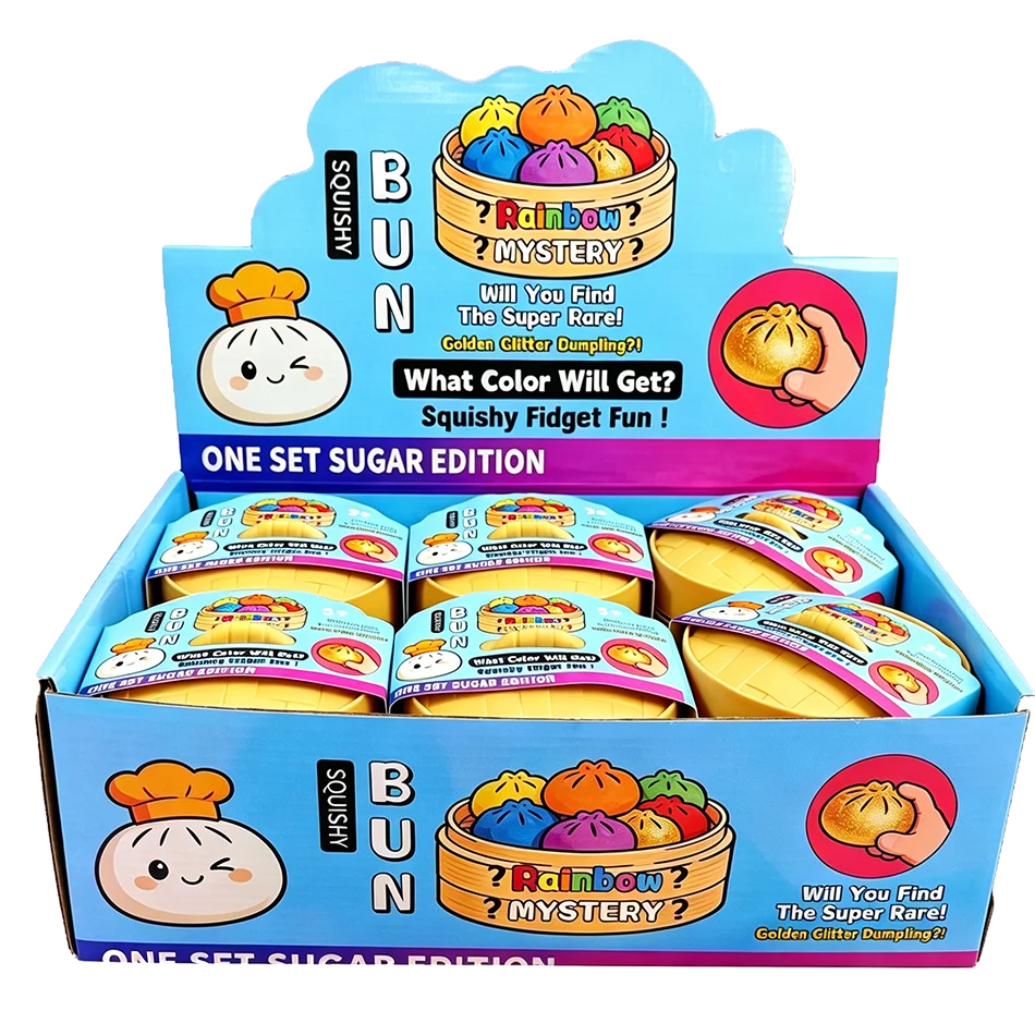 Soft foam dumpling slow rising squishy fidget toy in a yellow bamboo steamer box for tactile sensory play.