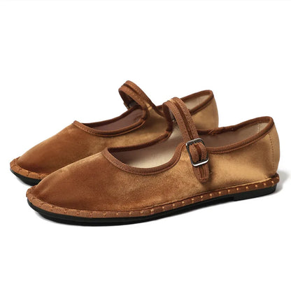 Women's floral-lined Mary Jane flats with buckle strap