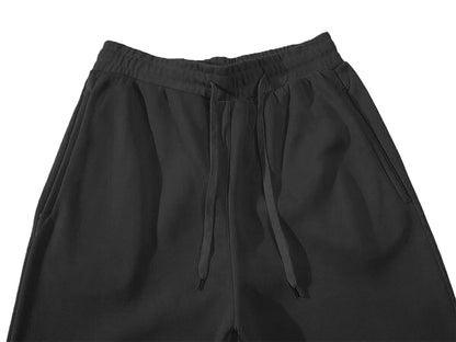 Black fleece-lined high waist jogger pants with an adjustable drawstring for cozy lounge wear.