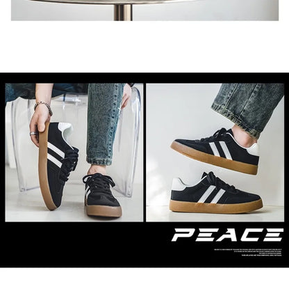 Black canvas sneakers with white stripes and gum soles, featuring a breathable design for casual training wear.