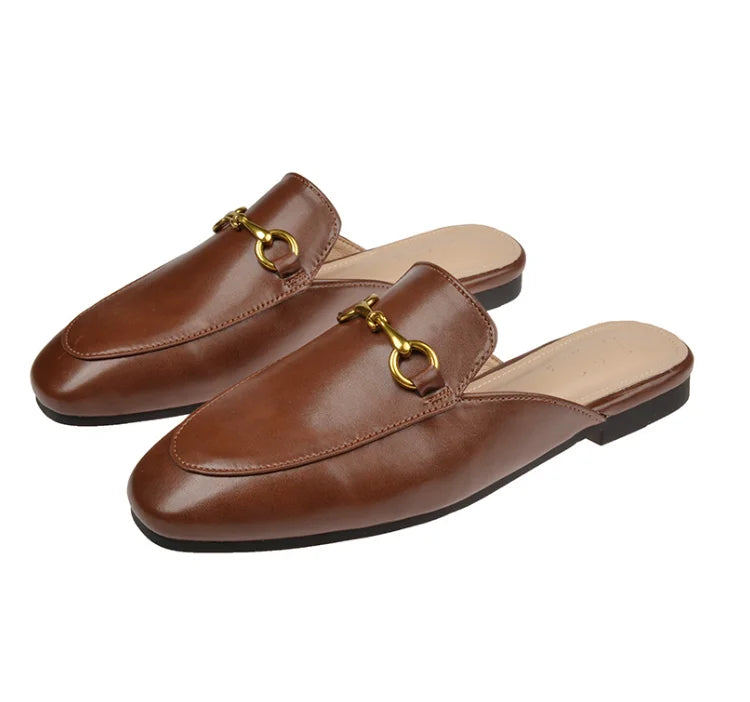 Brown faux leather slip-on shoes with gold metal chain detail for comfortable outdoor wear.