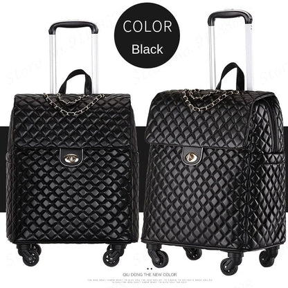 Black quilted PU leather retro rolling suitcase with a front flap, chain detail, gold lock, and retractable handle.