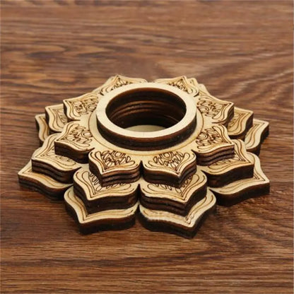 Layered light brown wooden crystal ball stand with an engraved lotus petal design and a central circular holder.