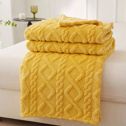 Coral fleece blanket with geometric jacquard pattern