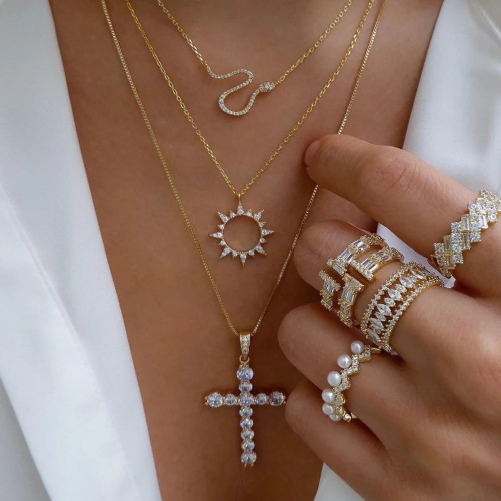 Necklace layered crystal pendant set with rhinestones and cross symbol