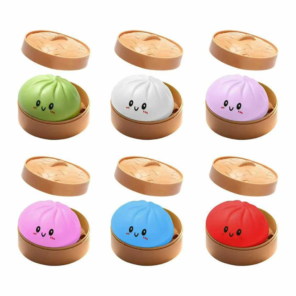 Colorful silicone dumpling squishies in mini bamboo steamer baskets for this fidget toy set.