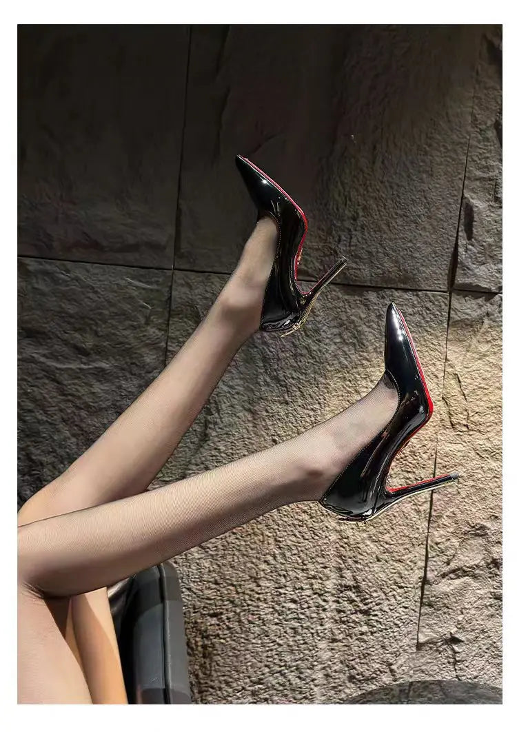 Black PU pointed toe stiletto pumps with fine heels and red soles for evening events.