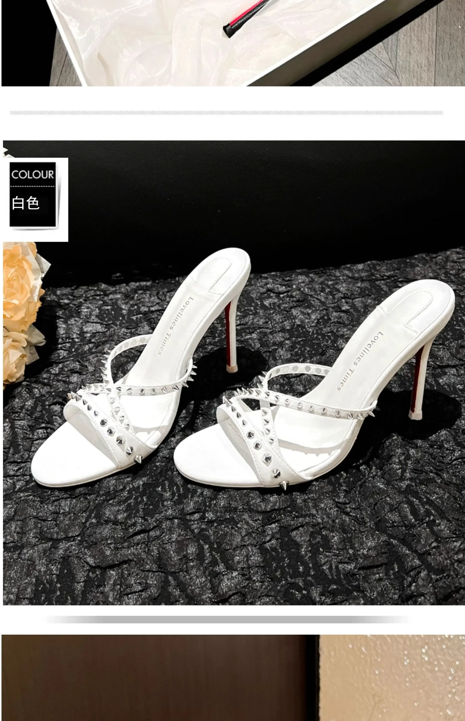 White open toe sandals with silver rivets and slim heels, a strappy design for evening wear.