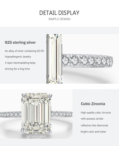 Silver sterling ring with a large emerald-cut zirconia center stone and pavé-set side stones.