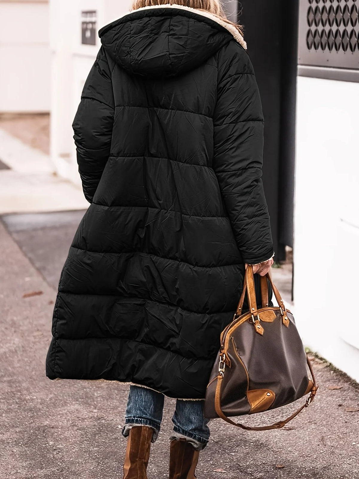 Women’s long hooded coat with zipper closure and pockets