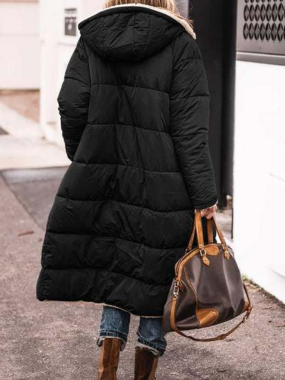 Women’s long hooded coat with zipper closure and pockets
