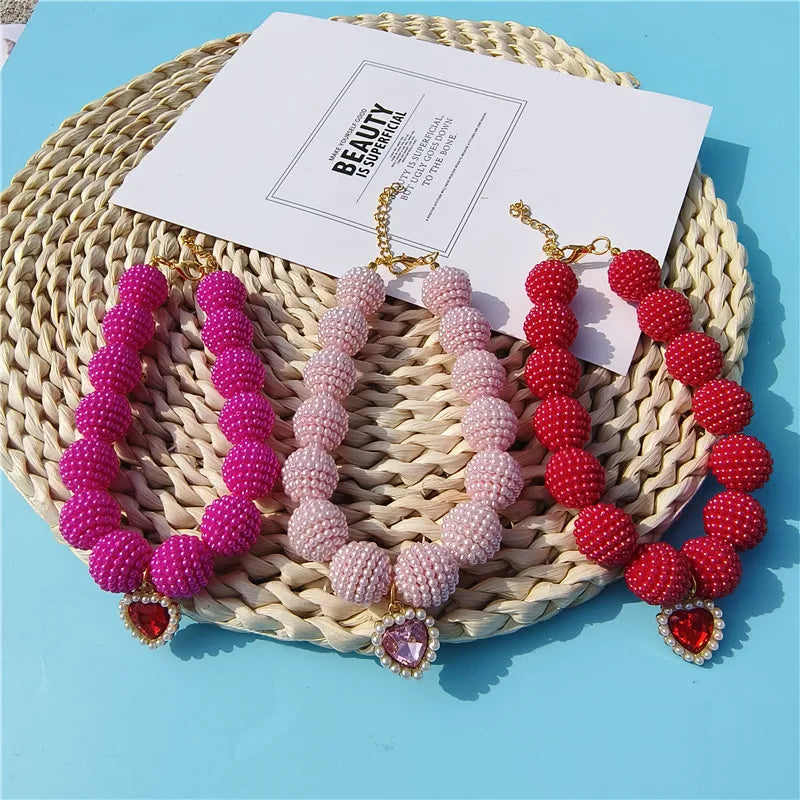 Heart-detail pet collar with pearl-style accents