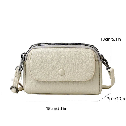 Women's phone crossbody bag with an interior zip pocket
