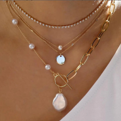 Layered necklace set with rhinestones pearls and coin pendant