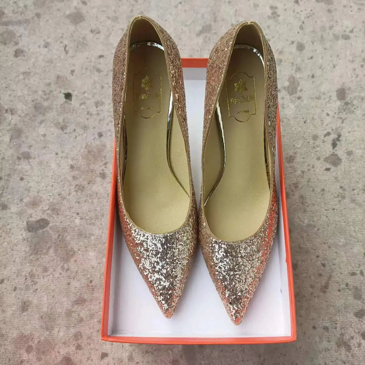 Gold glitter pointed-toe slim heel dress shoes with cushioned insoles for weddings.