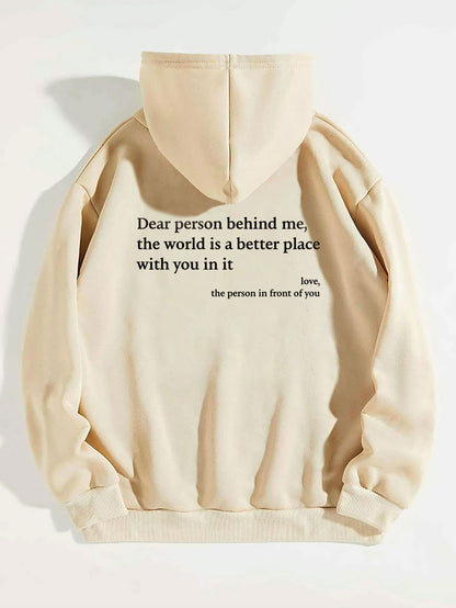 Beige oversized hoodie with black letter print and kangaroo pocket for daily comfort.