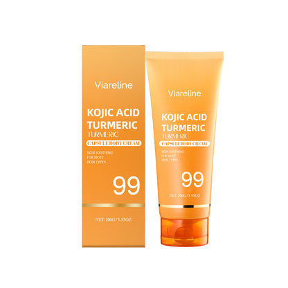 Orange body cream tube and matching retail box with kojic acid and turmeric text.