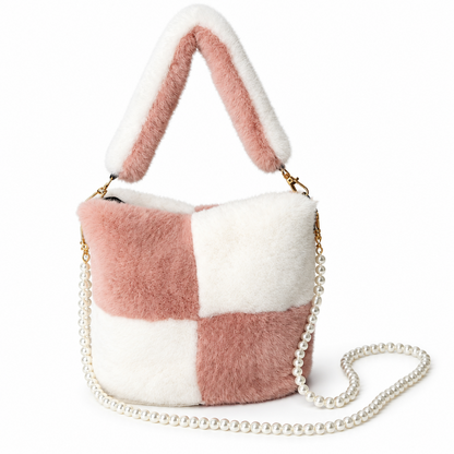 Pink and white faux fur bucket bag with a pearl chain strap